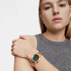 Reloj analógico con brazalete de acero IPG dorado y esfera negra Now^TOUS New